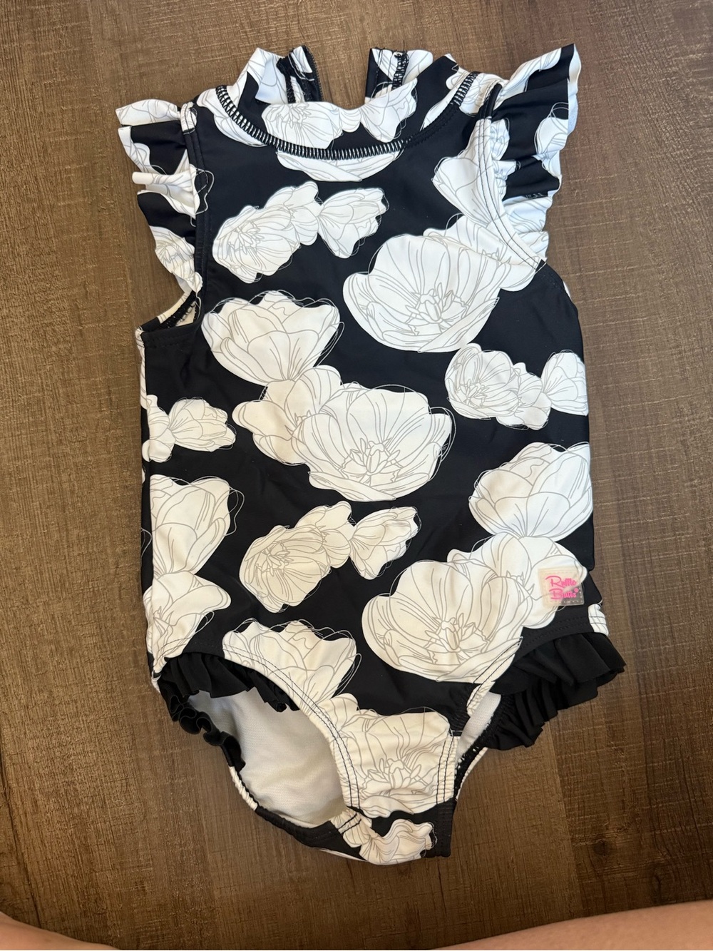 Ruffle Butts Black and White Floral Ruffle One-Piece
